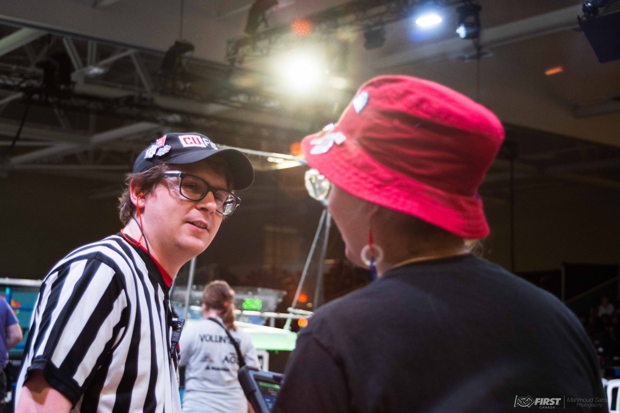 James Neumann working as a referee at a FIRST Robotics Competition event