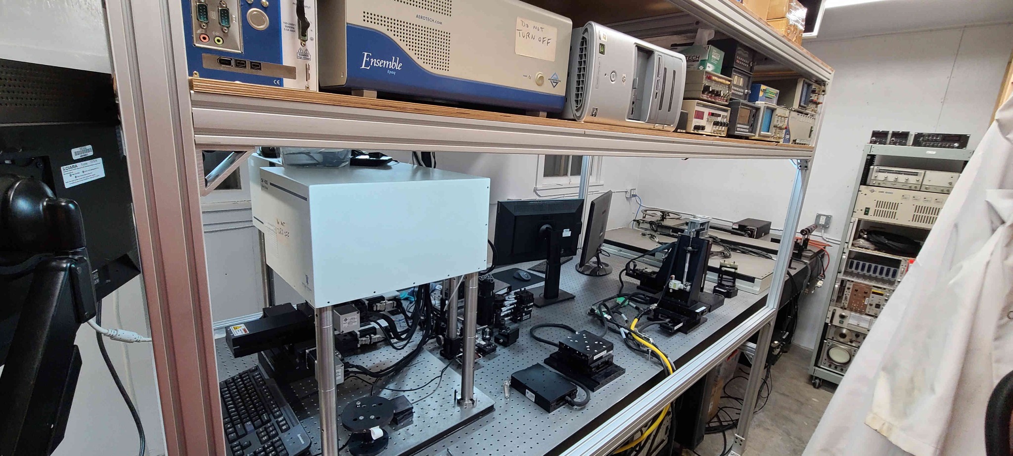 Enclosed laser micromachining optical table